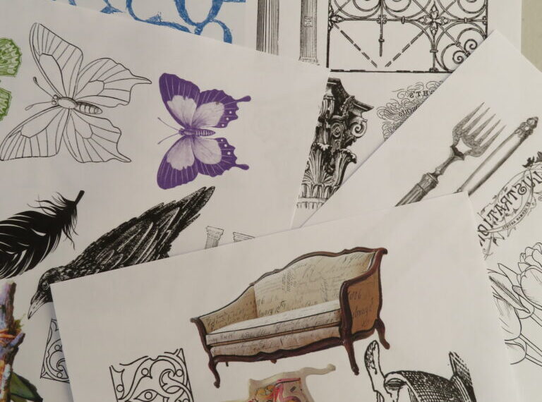 A pile of papers with various drawings on them.