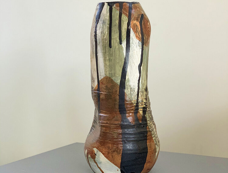 A vase on a table.