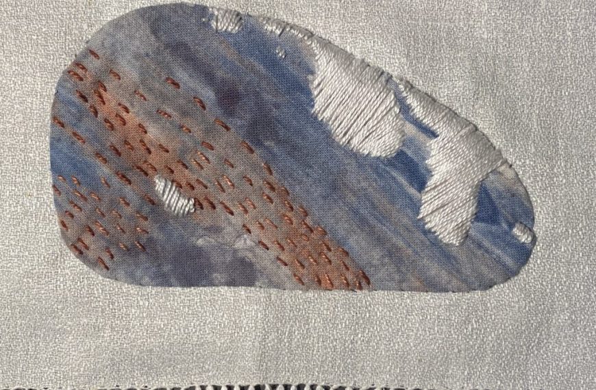 A piece of cloth with an image of a rock.