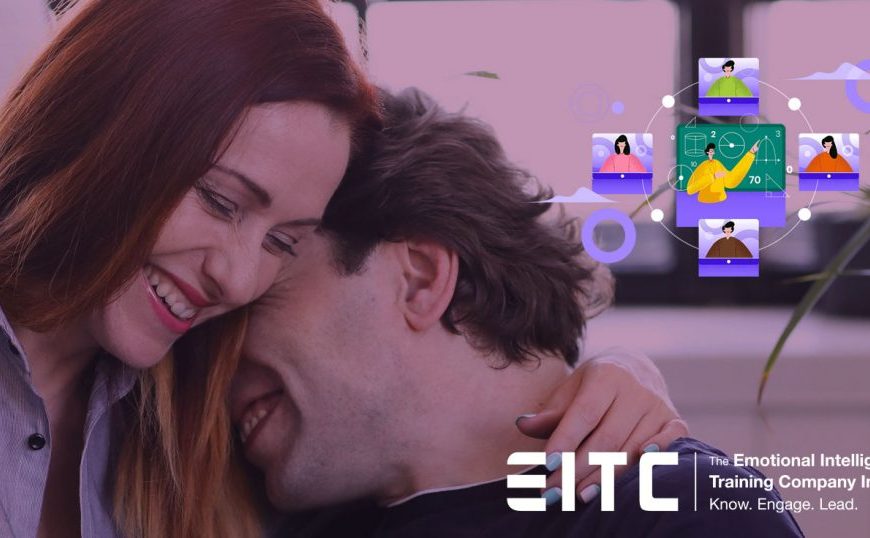 A man and woman hugging in front of a computer screen with the words etc.
