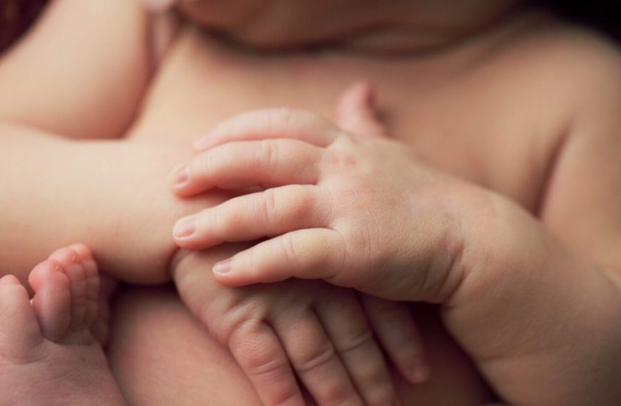 A close up of a baby's hands.