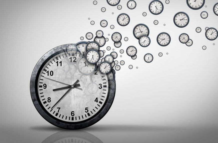 A clock with clocks flying out of it.