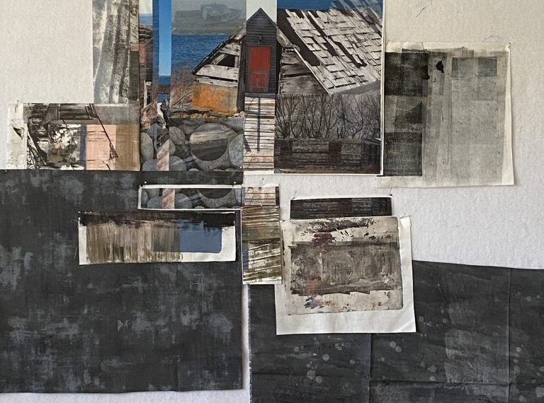 A room with various pieces of paper on the wall.