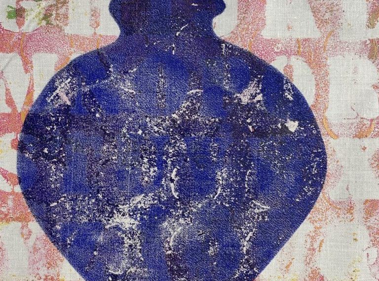An image of a blue vase on a piece of paper.