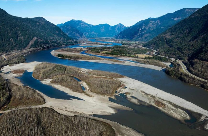 An aerial view of a river in the mountains.