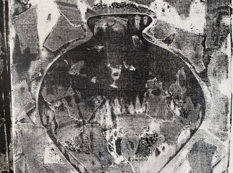 A black and white photograph of a vase.