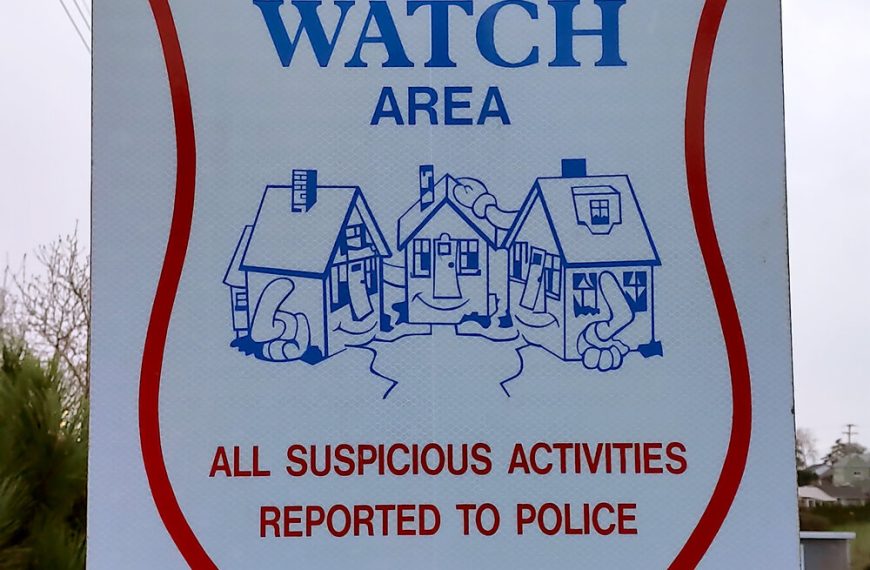 A block watch area sign.