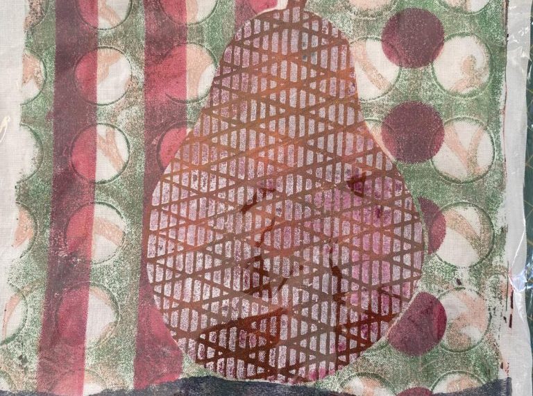 A piece of fabric with a pear on it.
