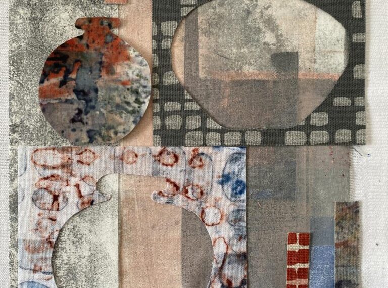 A piece of fabric with various pieces of art on it.