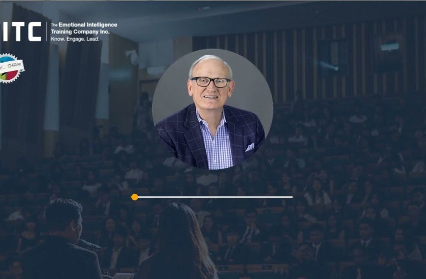 An image of a man in front of an audience.
