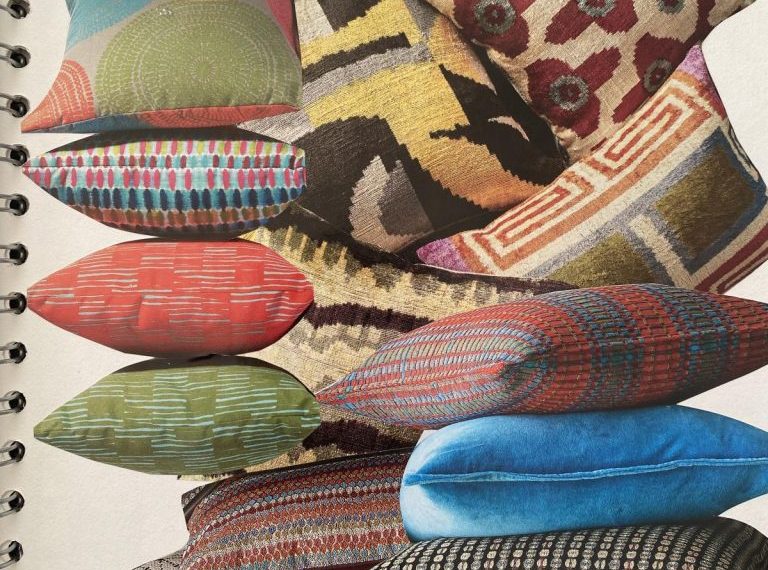 A collection of pillows in a spiral notebook.