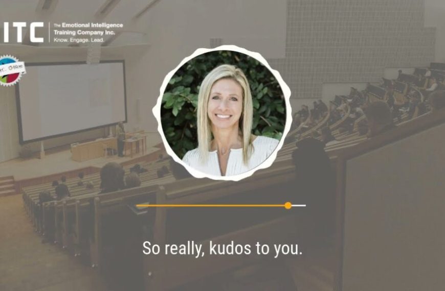 An image of a woman in front of an audience.