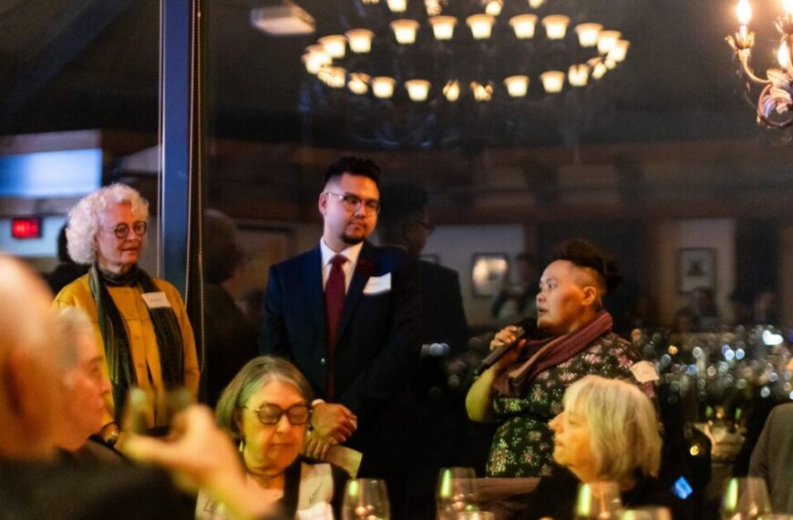 A group of people sitting around a table at the inaugural Raincoast Ocean Science Awards in 2023.