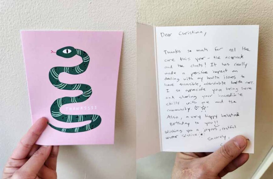A handwritten note expressing seasonal gratitudes, embellished with a charming snake illustration.