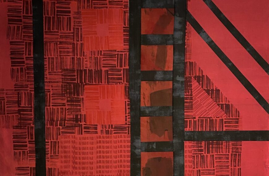 A red and black piece of art with a black background that can't be ignored.