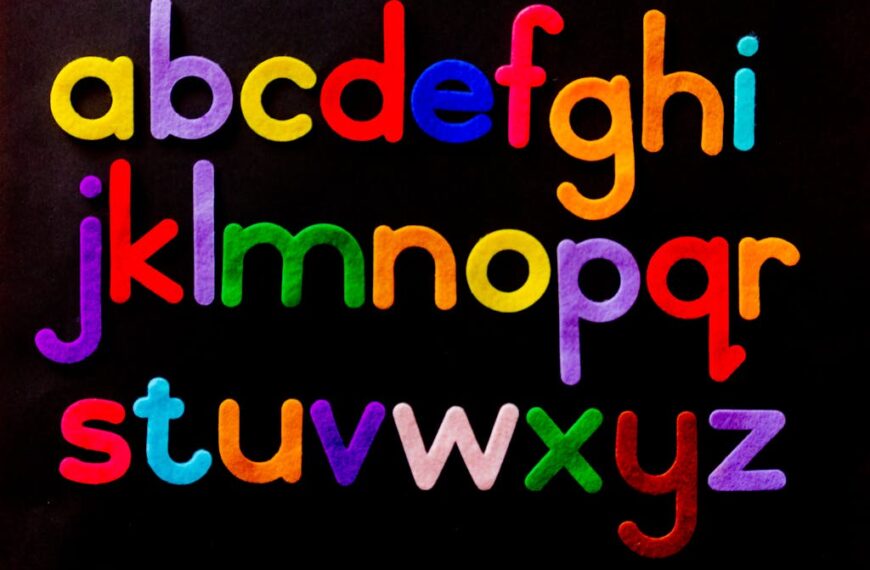 Colorful felt letters of the alphabet, enhancing literacy skills, are displayed on a black background.