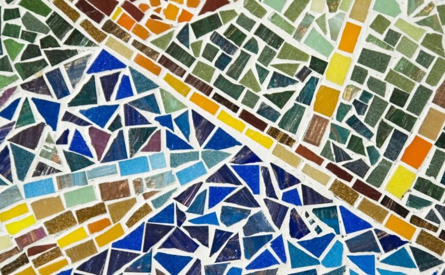 Colorful mosaic made of small, irregularly shaped tiles in various shades, arranged in intersecting patterns—a striking visual that highlights both artistic expression and content ownership.